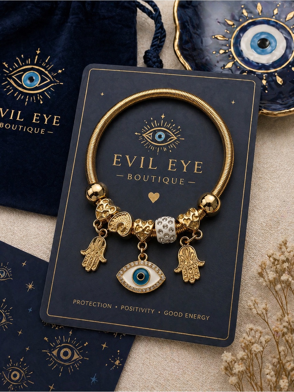 Gold Hamsa Charm Bracelet with Blue Eye